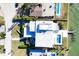 Bird's-eye view of a modern waterfront home with pool and dock at 3638 San Remo Ter, Sarasota, FL 34239
