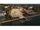 Waterfront property with pool, dock, and stunning sunset views at 3638 San Remo Ter, Sarasota, FL 34239