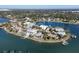 Wide aerial showcasing waterfront home and surrounding community at 3638 San Remo Ter, Sarasota, FL 34239