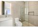 Clean bathroom with a walk in shower at 3638 San Remo Ter, Sarasota, FL 34239