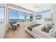 Bright bedroom with water views and sitting area at 3638 San Remo Ter, Sarasota, FL 34239