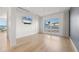 Bright bedroom with hardwood floors and water views at 3638 San Remo Ter, Sarasota, FL 34239