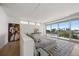 Main bedroom with water views and light-colored flooring at 3638 San Remo Ter, Sarasota, FL 34239