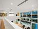Modern home interior with an open floor plan and water views at 3638 San Remo Ter, Sarasota, FL 34239