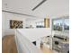 A modern home's interior showcasing an open floor plan with water views at 3638 San Remo Ter, Sarasota, FL 34239