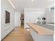 Modern white kitchen with wood countertops and high-end appliances at 3638 San Remo Ter, Sarasota, FL 34239