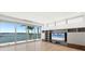 Living area with water views and built-in entertainment center at 3638 San Remo Ter, Sarasota, FL 34239