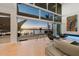 Living area features water views and sliding glass doors to patio at 3638 San Remo Ter, Sarasota, FL 34239