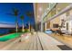 Backyard patio with pool and modern furniture at 3638 San Remo Ter, Sarasota, FL 34239