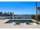 Relaxing pool with tranquil water views and modern planters at 3638 San Remo Ter, Sarasota, FL 34239