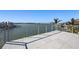 Sun-drenched rooftop deck with panoramic waterfront views at 3638 San Remo Ter, Sarasota, FL 34239