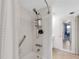 Bathroom with shower/tub combo and a mirror at 3751 Lake Bayshore Dr # H304, Bradenton, FL 34205