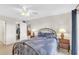 Bedroom with double bed, dresser and access to a closet at 3751 Lake Bayshore Dr # H304, Bradenton, FL 34205