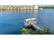 Wooden dock on waterfront with shade structure at 3751 Lake Bayshore Dr # H304, Bradenton, FL 34205