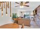 Living room with a brown couch and a rustic wood accent wall at 3751 Lake Bayshore Dr # H304, Bradenton, FL 34205