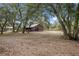 Large barn with covered stalls and open space at 38355 State Road 64 E, Myakka City, FL 34251