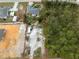 Aerial view highlighting the property lines of a house and empty lot at 3972 Titan St, North Port, FL 34286