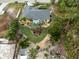 Aerial view of home showcasing unique heart-shaped lawn and landscaping at 3972 Titan St, North Port, FL 34286