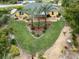 Charming home with a landscaped backyard, featuring a unique heart-shaped garden at 3972 Titan St, North Port, FL 34286