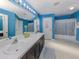 Double vanity bathroom with shower and tub at 3972 Titan St, North Port, FL 34286