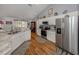 Modern kitchen with stainless steel appliances and granite countertops at 3972 Titan St, North Port, FL 34286