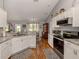 Spacious kitchen featuring granite countertops and stainless steel appliances at 3972 Titan St, North Port, FL 34286