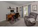 Home office features a desk, chair, and recliner at 3972 Titan St, North Port, FL 34286