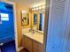 Bright bathroom with double vanity and tub at 4210 Ironwood Cir # 308J, Bradenton, FL 34209