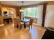 Dining area with kitchen partially visible at 4210 Ironwood Cir # 308J, Bradenton, FL 34209
