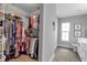 Bright bathroom with walk-in closet and wood floor at 4310 Zenith Rd, Venice, FL 34293