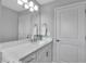 Modern bathroom with white vanity and quartz countertop at 4310 Zenith Rd, Venice, FL 34293
