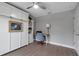 Bedroom with murphy bed, shelving, and desk at 4310 Zenith Rd, Venice, FL 34293