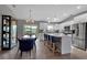 Bright kitchen with an island, stainless steel appliances, and a dining area at 4310 Zenith Rd, Venice, FL 34293