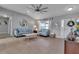 Living room with light blue sofas and wood flooring at 4310 Zenith Rd, Venice, FL 34293