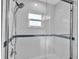 Updated shower with subway tile and glass enclosure at 4310 Zenith Rd, Venice, FL 34293