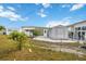 Mobile home with storage shed and fenced backyard at 4953 Sea Island Ave, Sarasota, FL 34234