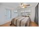 Bright bedroom featuring a double bed and window coverings at 4953 Sea Island Ave, Sarasota, FL 34234