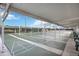Community shuffleboard courts with covered seating at 4953 Sea Island Ave, Sarasota, FL 34234