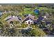 Aerial view of community clubhouse and golf course at 5023 Tobermory Way, Bradenton, FL 34211
