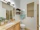 Updated bathroom with vanity, toilet and shower at 5023 Tobermory Way, Bradenton, FL 34211