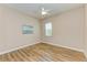Spacious bedroom with hardwood floors and ceiling fan at 5023 Tobermory Way, Bradenton, FL 34211