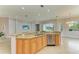 Spacious kitchen with granite countertops and stainless steel appliances at 5023 Tobermory Way, Bradenton, FL 34211