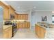 Updated kitchen with stainless steel appliances and granite counters at 5023 Tobermory Way, Bradenton, FL 34211