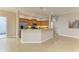 Modern kitchen with granite countertops and stainless steel appliances at 5023 Tobermory Way, Bradenton, FL 34211