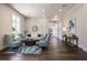 Lobby area with seating, hardwood floors, and stone wall at 5023 Tobermory Way, Bradenton, FL 34211