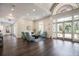 Spacious lobby with comfortable seating and hardwood floors at 5023 Tobermory Way, Bradenton, FL 34211