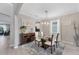 Bright dining room with table and chairs near kitchen at 520 Mimosa Ct, Bradenton, FL 34212