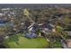 Aerial view of community clubhouse with outdoor seating overlooking the golf course at 5318 88Th E St, Bradenton, FL 34211