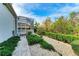 Landscaped backyard with screened patio and walkway at 5318 88Th E St, Bradenton, FL 34211