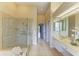 Primary bathroom with a large walk in shower and separate tub at 5318 88Th E St, Bradenton, FL 34211